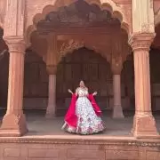 Ivory multi coloured heavy thread and sequin embroidered lehenga with hand embroidered details