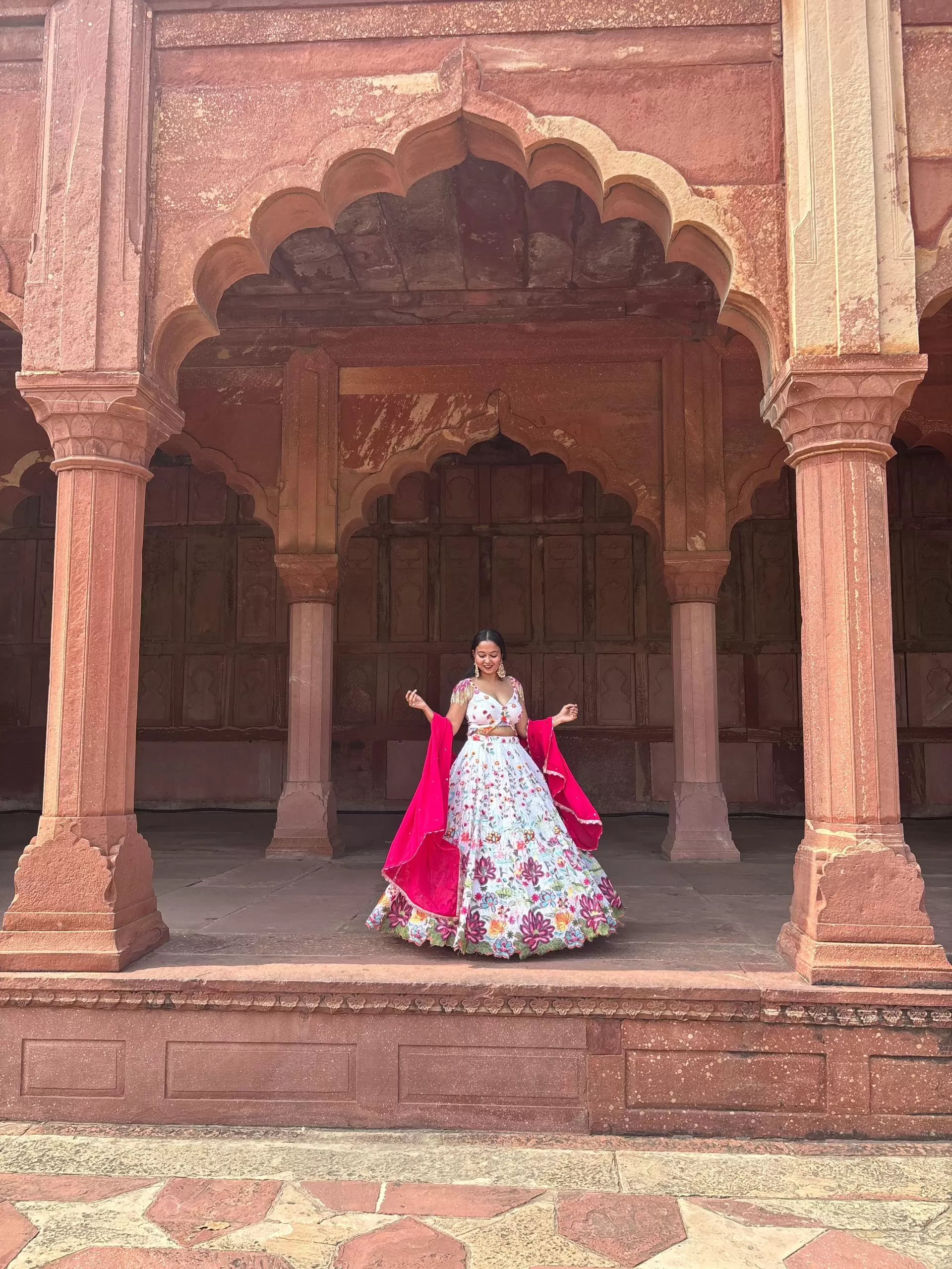 Ivory multi coloured heavy thread and sequin embroidered lehenga with hand embroidered details