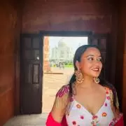 Ivory multi coloured heavy thread and sequin embroidered lehenga with hand embroidered details