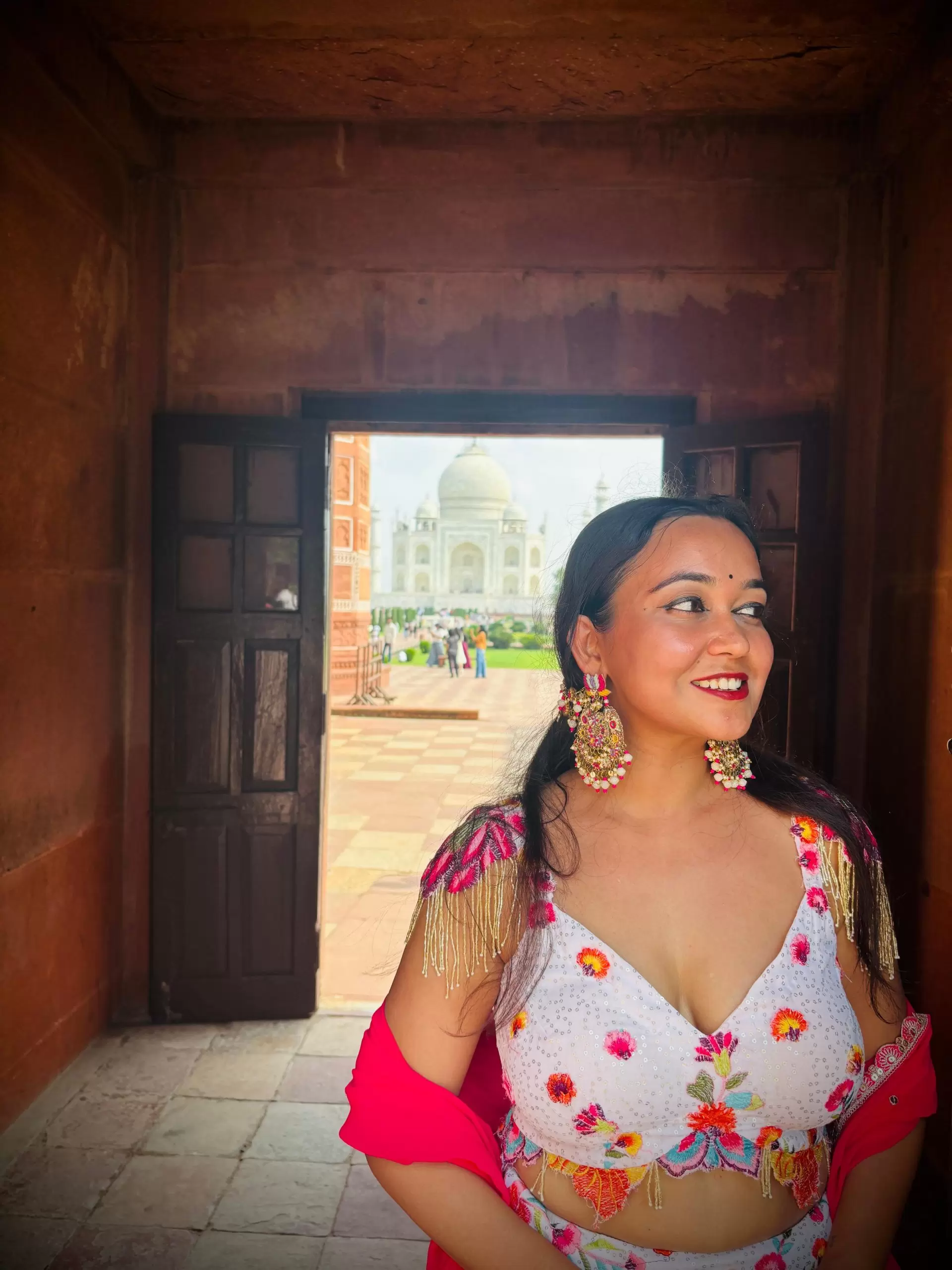 Ivory multi coloured heavy thread and sequin embroidered lehenga with hand embroidered details
