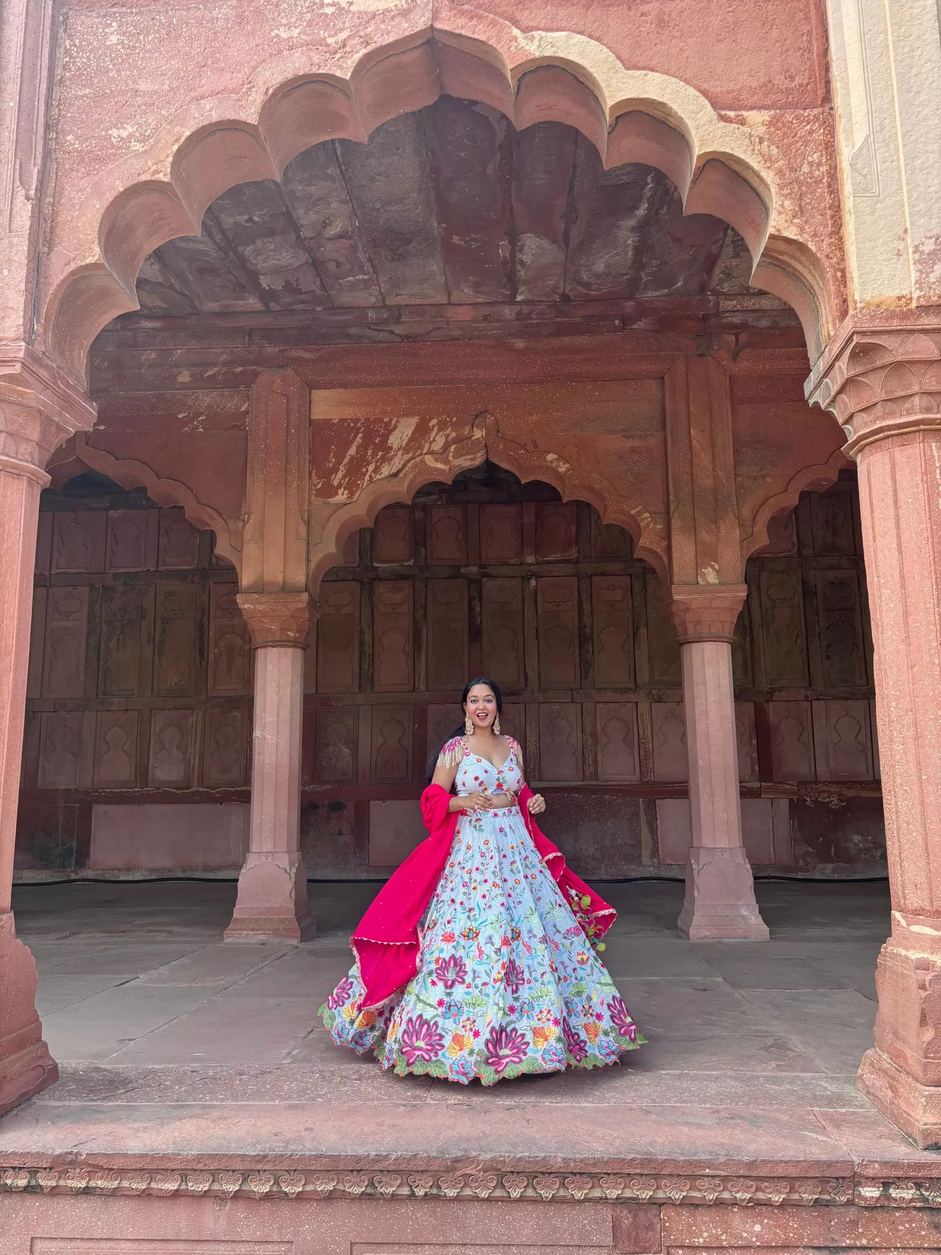 Ivory multi coloured heavy thread and sequin embroidered lehenga with hand embroidered details