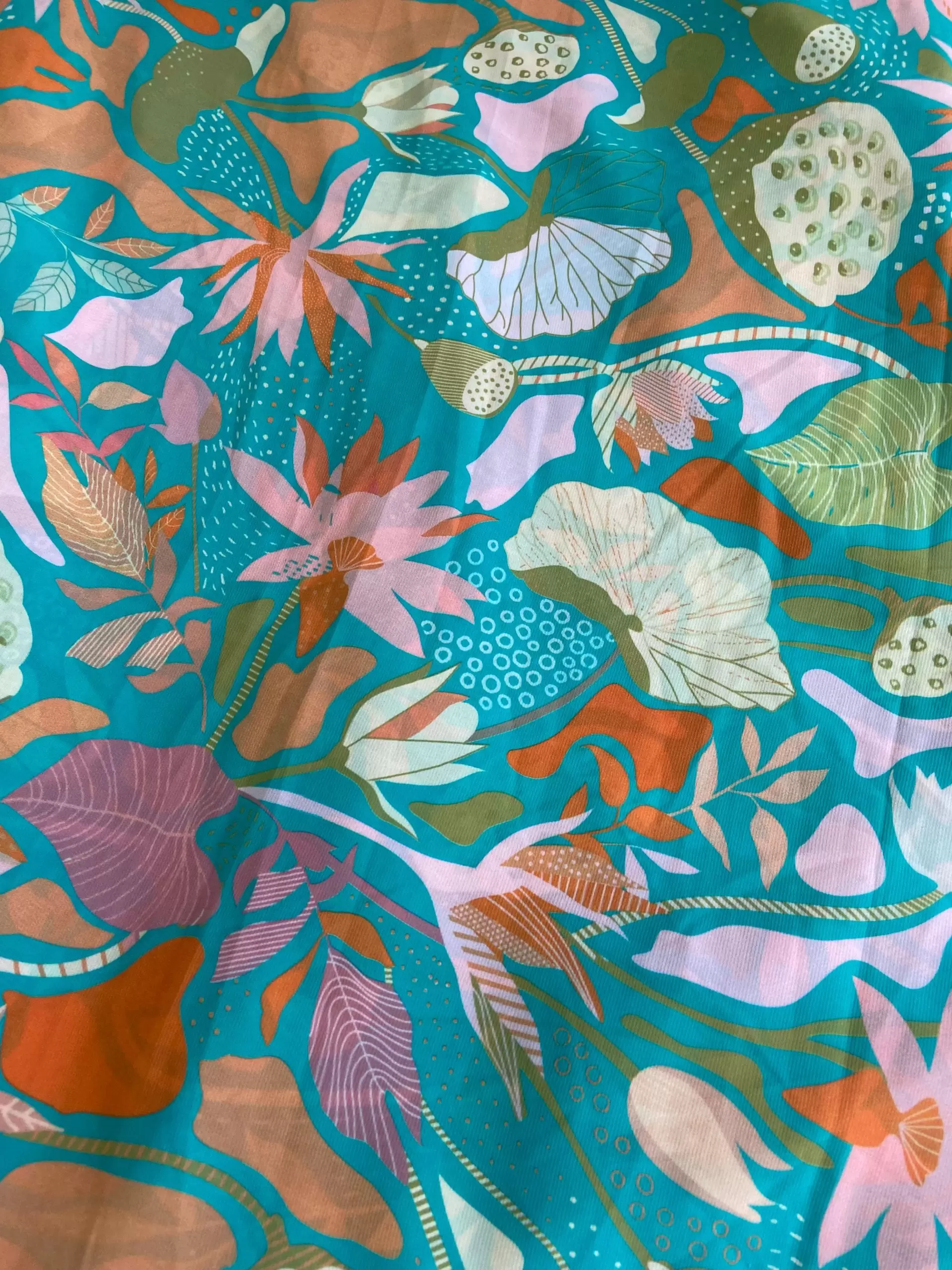 Aqua blue printed georgette fabric with multi colour floral pattern