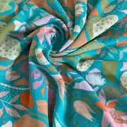 Aqua blue printed georgette fabric with multi colour floral pattern