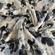 Grey printed georgette fabric with black and white floral pattern
