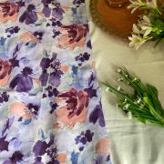 Lavender printed georgette fabric with multi colour floral pattern