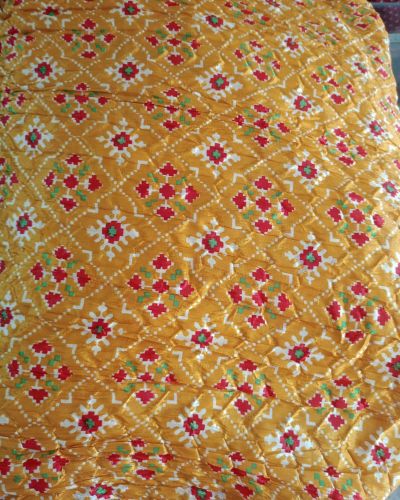 Yellow lehenga style with patola printed fabric
