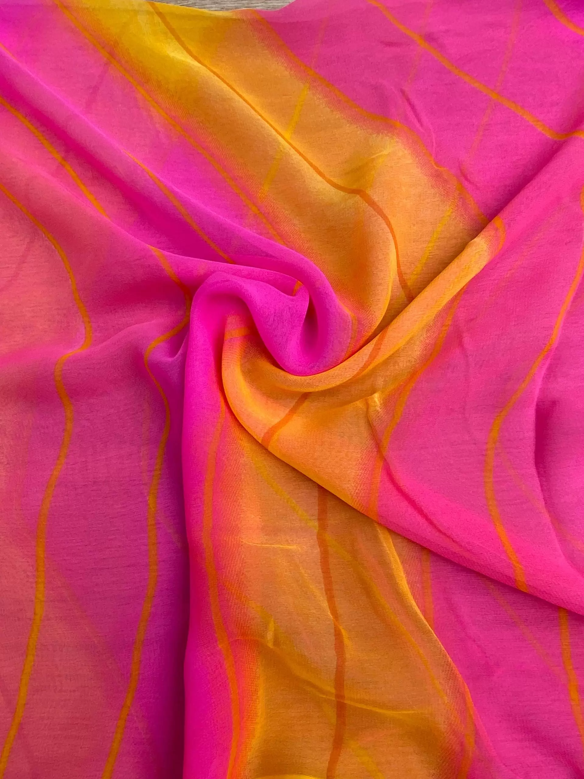 Yellow and pink printed georgette fabric