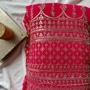 Gold Sequin Embroidery With Heavy Border On Dark Pink Georgette Fabric