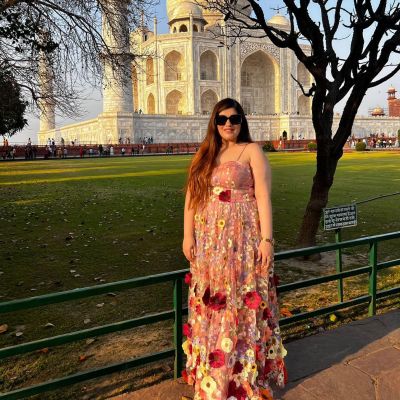 Multicolour Flower Applique On White Big Width Net Fabric Gown