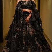 Designer Off Shoulder Heavy Golden Cut Dana & Sequin Embroidered Lehenga In Black Colour