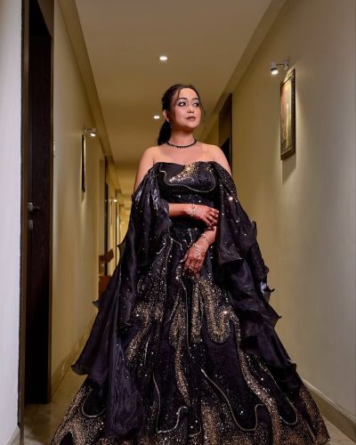 Designer Off Shoulder Heavy Golden Cut Dana & Sequin Embroidered Lehenga In Black Colour