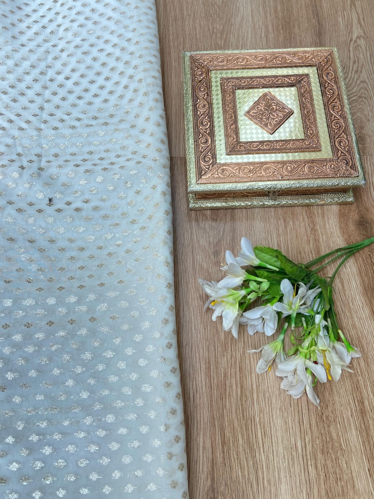 Pure Dyeable Khaddi Georgette Fabric With Woven Small Dot Buti