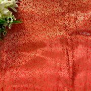 Orange Brocade Banarasi Silk Fabric With Golden Weaving