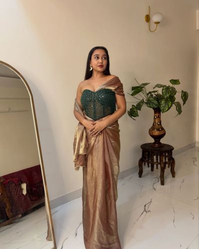 Golden Open Saree With Corset Blouse